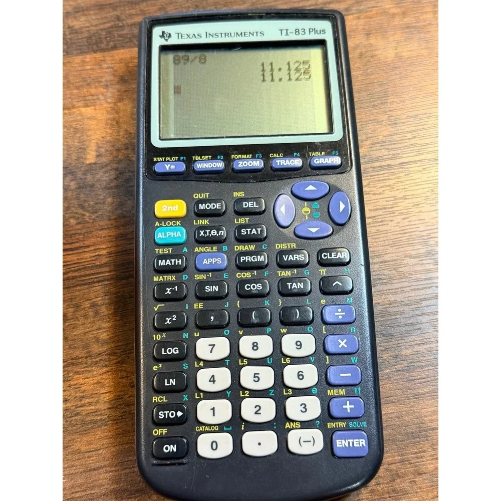 Texas Instruments TI-83 Plus graphing calculator with cover.  1999. Tested